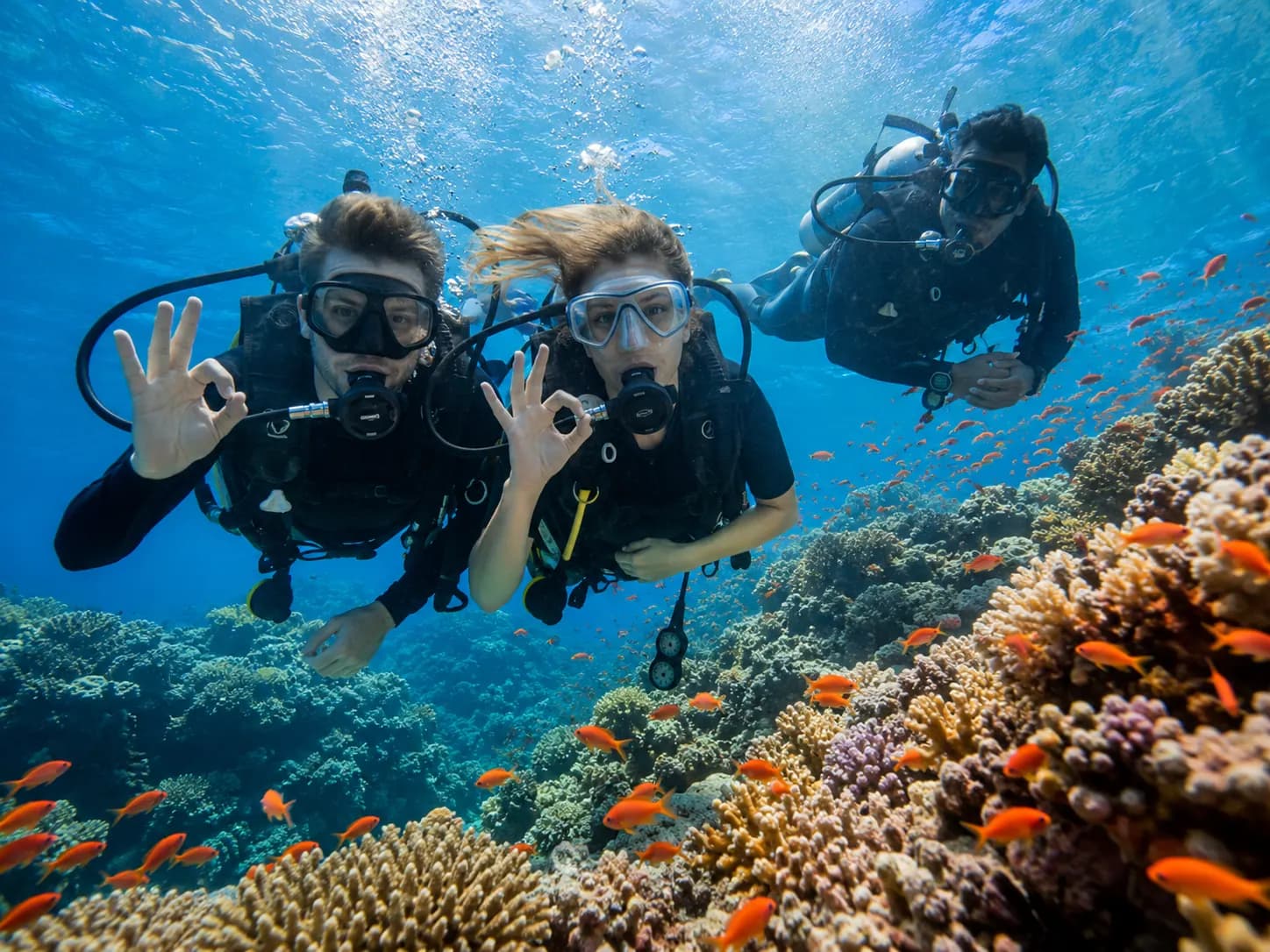 Beginner trying scuba diving for the first time in the Red Sea
