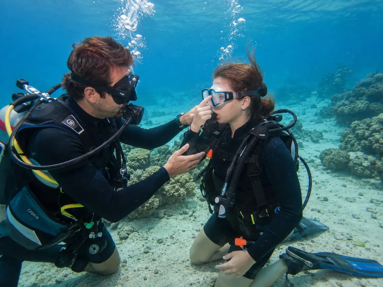 Beginner trying scuba diving for the first time in the Red Sea