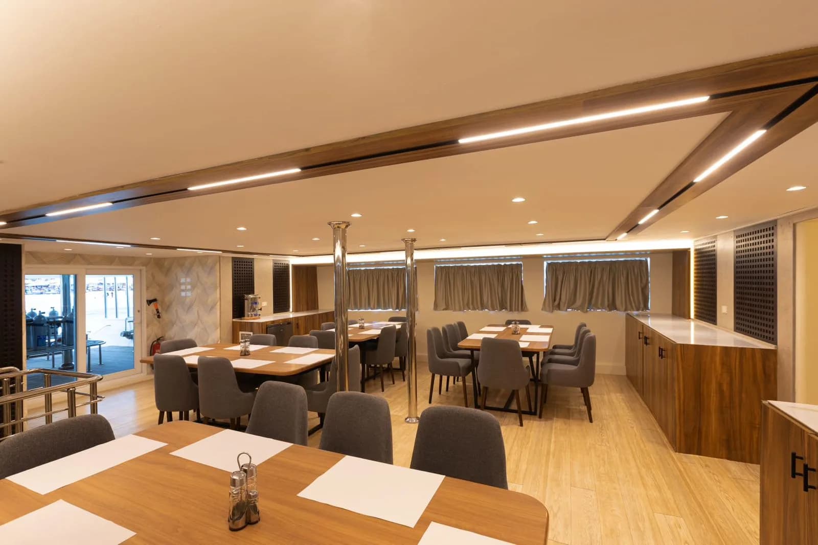 The restaurant on board, laid for dinner